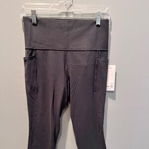 NWT Gray Athleta Salutation Stash 7/8 Leggings